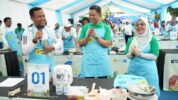 Gubernur Sulawesi Selatan, Andi Sudirman Sulaiman (Kiri), General Manager PLN UID Sulselrabar, Edyansyah (Tengah), dan Senior Manager Niaga dan Manajemen Pelanggan, Yuli Ashaniais (Kanan) Tengah Bersiap-siap untuk Mengikuti Electric Cook Fest, Lomba Memasak Menggunakan Berbagai Peralatan Rumah Tangga Berbasis Listrik pada Sabtu, (18/10/2025).
